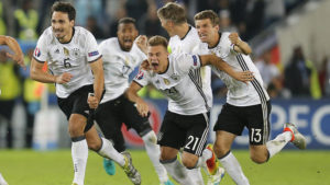 German players celebrate after winning the penalty shootout of the Euro 2016 quarterfinal soccer match between Germany and Italy, at the Nouveau Stade in Bordeaux, France, Saturday, July 2, 2016. (AP Photo/Michael Probst)